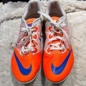 Nike men’s orange and Blue Training cleats
